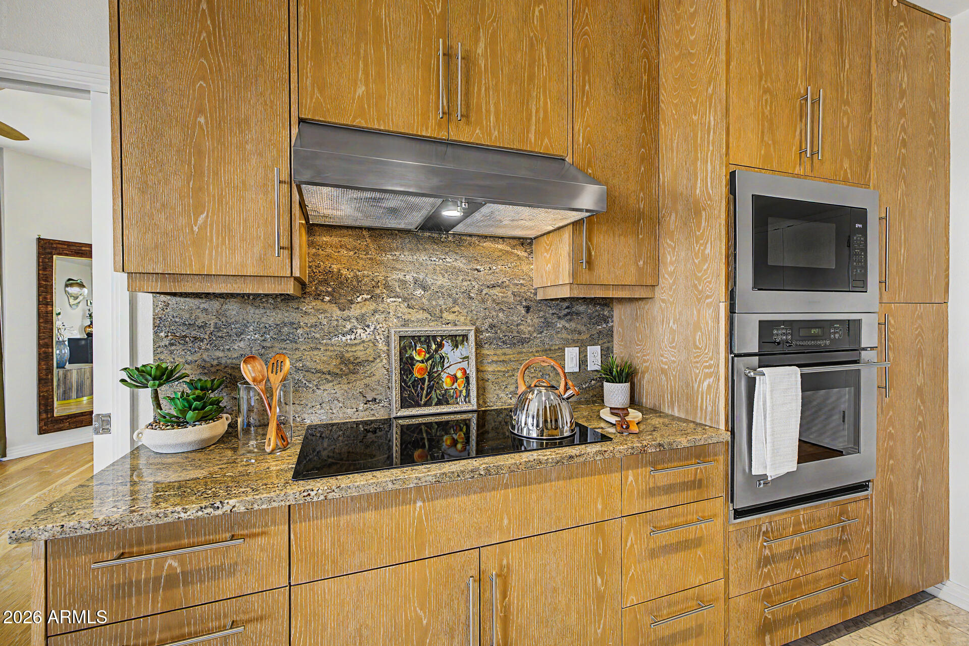 1040 East Osborn Road, Unit 402 Phoenix, AZ 85014 - Photo 33 of 96 a kitchen with a sink and cabinets