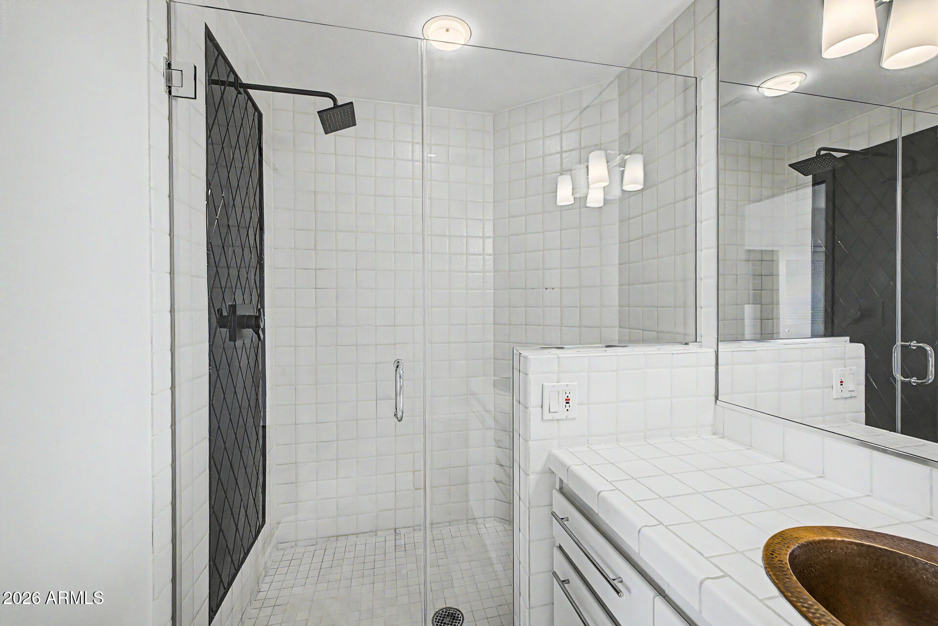 1040 East Osborn Road, Unit 402 Phoenix, AZ 85014 - Photo 55 of 96 a bathroom with a sink a toilet and shower