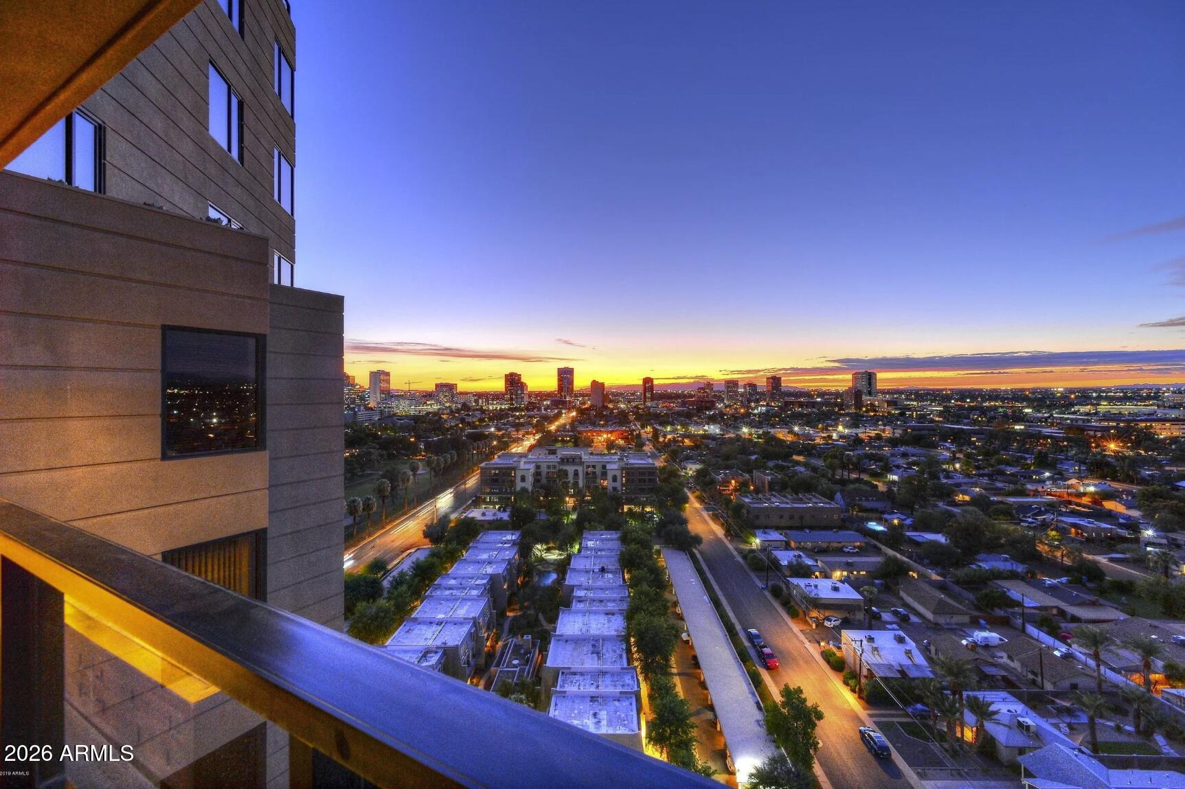 1040 East Osborn Road, Unit 402 Phoenix, AZ 85014 - Photo 6 of 96 a city view from a balcony