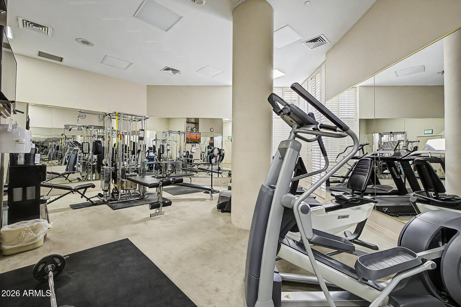 1040 East Osborn Road, Unit 402 Phoenix, AZ 85014 - Photo 73 of 96 a view of a room with gym equipment