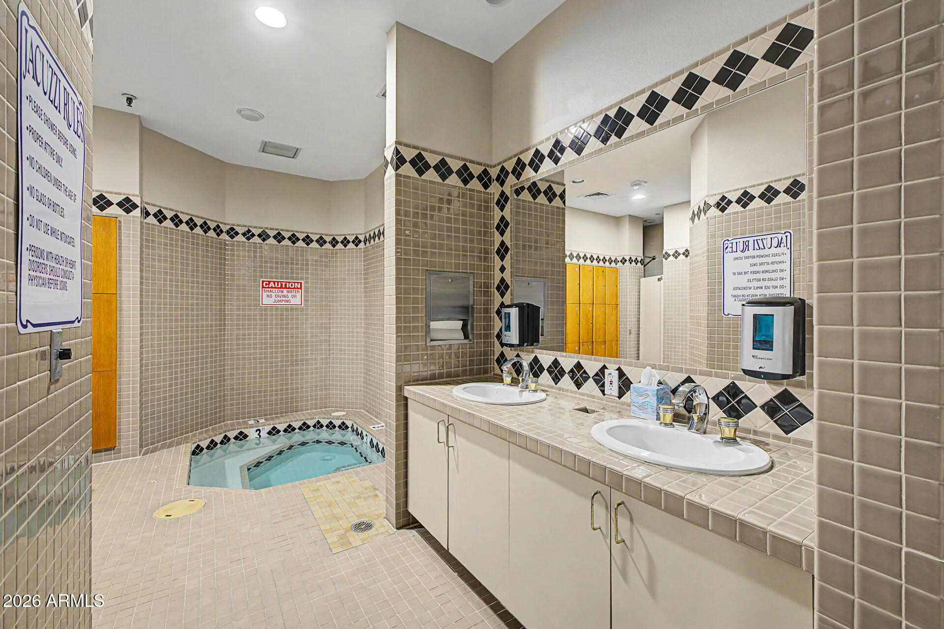 1040 East Osborn Road, Unit 402 Phoenix, AZ 85014 - Photo 74 of 96 a bathroom with a granite countertop sink a mirror a bathtub and shower