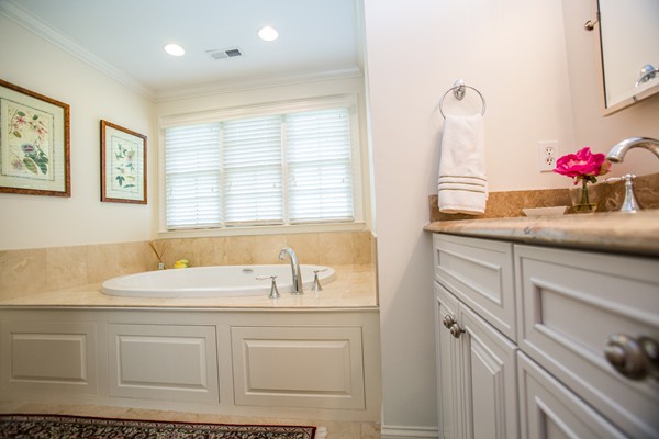 27 Amherst Road Wellesley, MA 02482 - Photo 18 of 20 a bathroom with a sink and a mirror