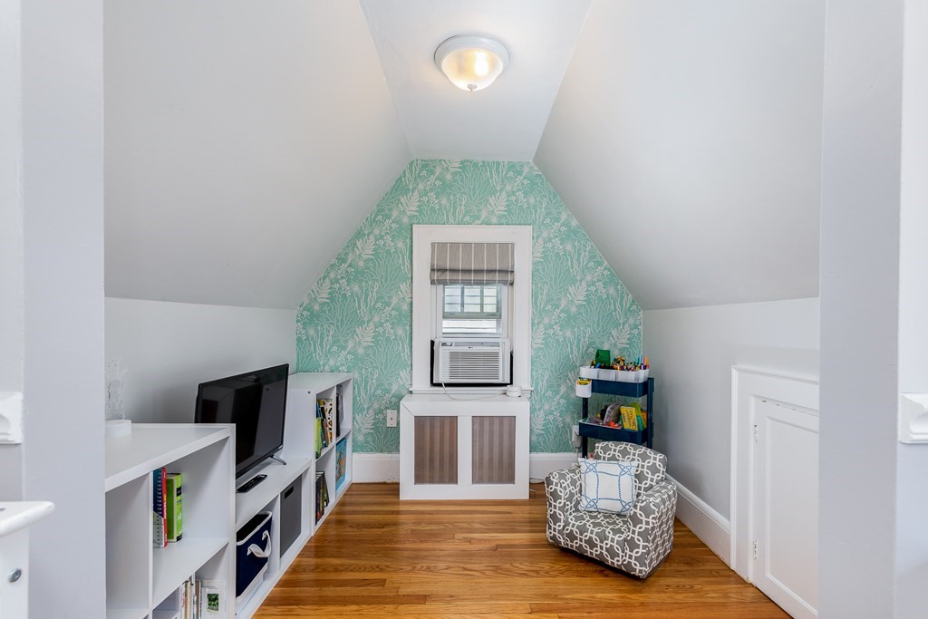 8 Pickwick Road Marblehead, MA 01945 - Photo 23 of 35 a living room with furniture and a flat screen tv