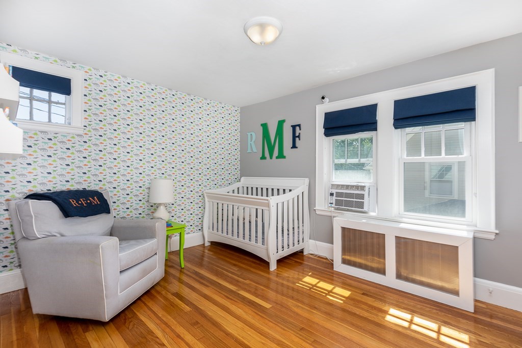 8 Pickwick Road Marblehead, MA 01945 - Photo 24 of 35 a bedroom with furniture and a window