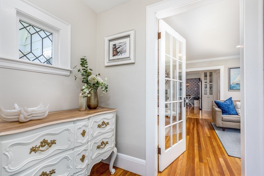 8 Pickwick Road Marblehead, MA 01945 - Photo 4 of 35 a bedroom with a bed and wooden floor