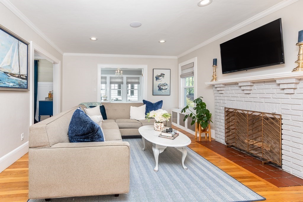 8 Pickwick Road Marblehead, MA 01945 - Photo 5 of 35 a living room with fireplace furniture and a flat screen tv