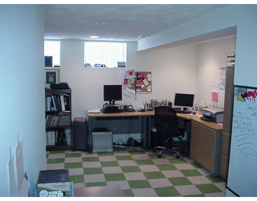 66 Robbins Road Watertown, MA 02472 - Photo 12 of 16 a room with a workspace and a window