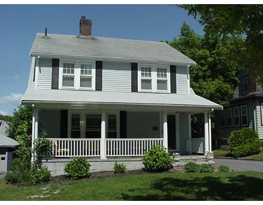 66 Robbins Road Watertown, MA 02472 - Photo 2 of 16 a front view of a house with a garden