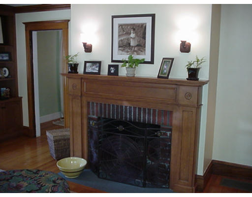 66 Robbins Road Watertown, MA 02472 - Photo 5 of 16 a living room with furniture and a fireplace