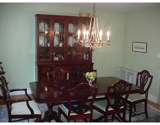 66 Robbins Road Watertown, MA 02472 - Photo 6 of 16 a view of a dining room with furniture and chandelier