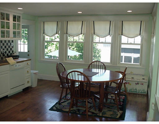 66 Robbins Road Watertown, MA 02472 - Photo 9 of 16 a view of a dining room with furniture window and outside view