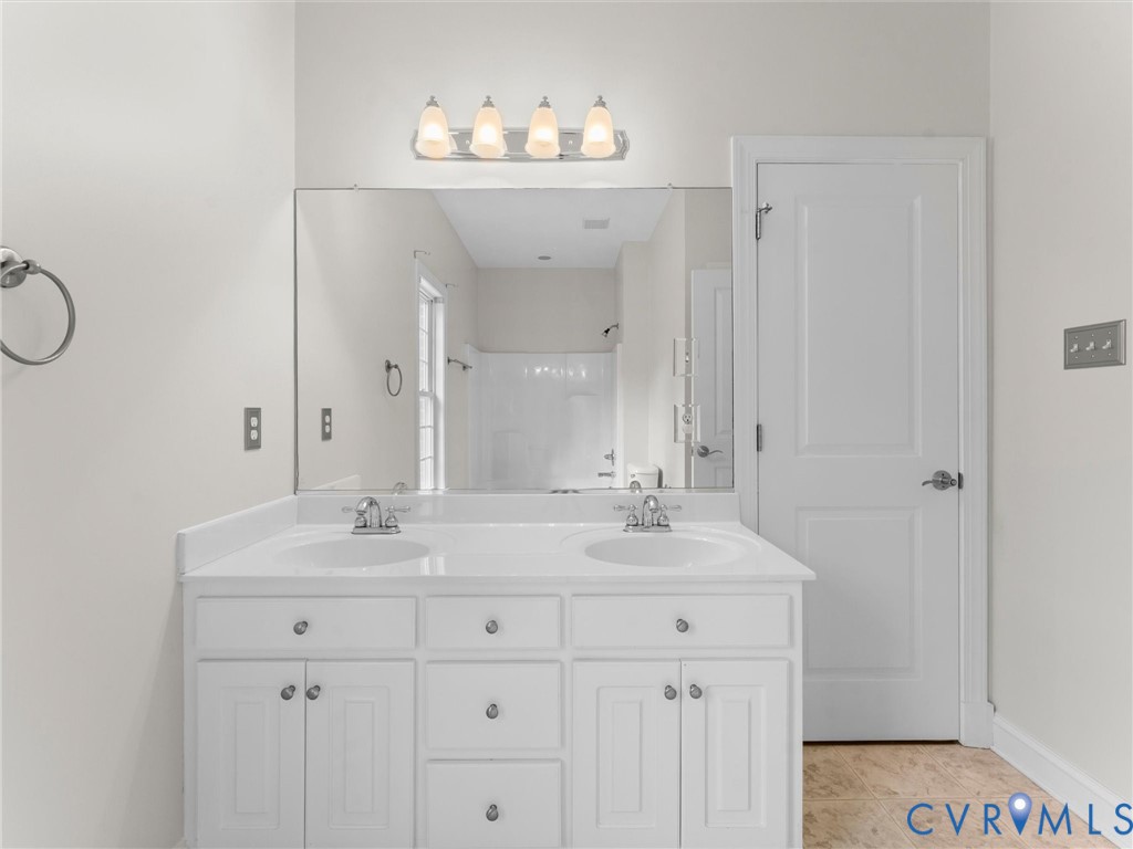6611 Ammon Road Ford, VA 23850 - Photo 36 of 78 Bathroom vanity with dual undermount sinks, white