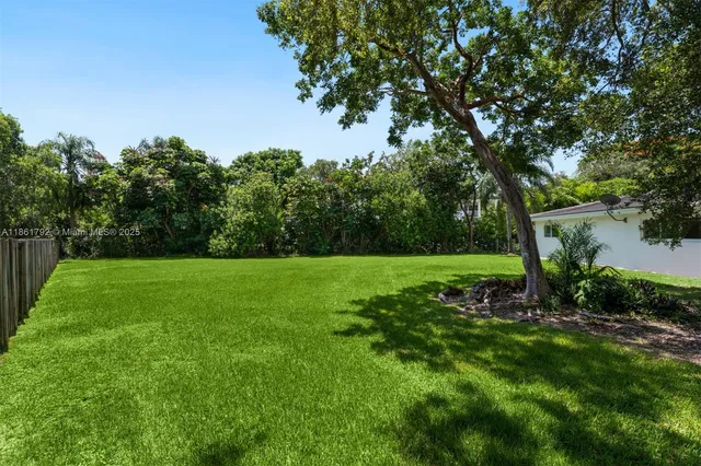 a view of a garden with an outdoor space