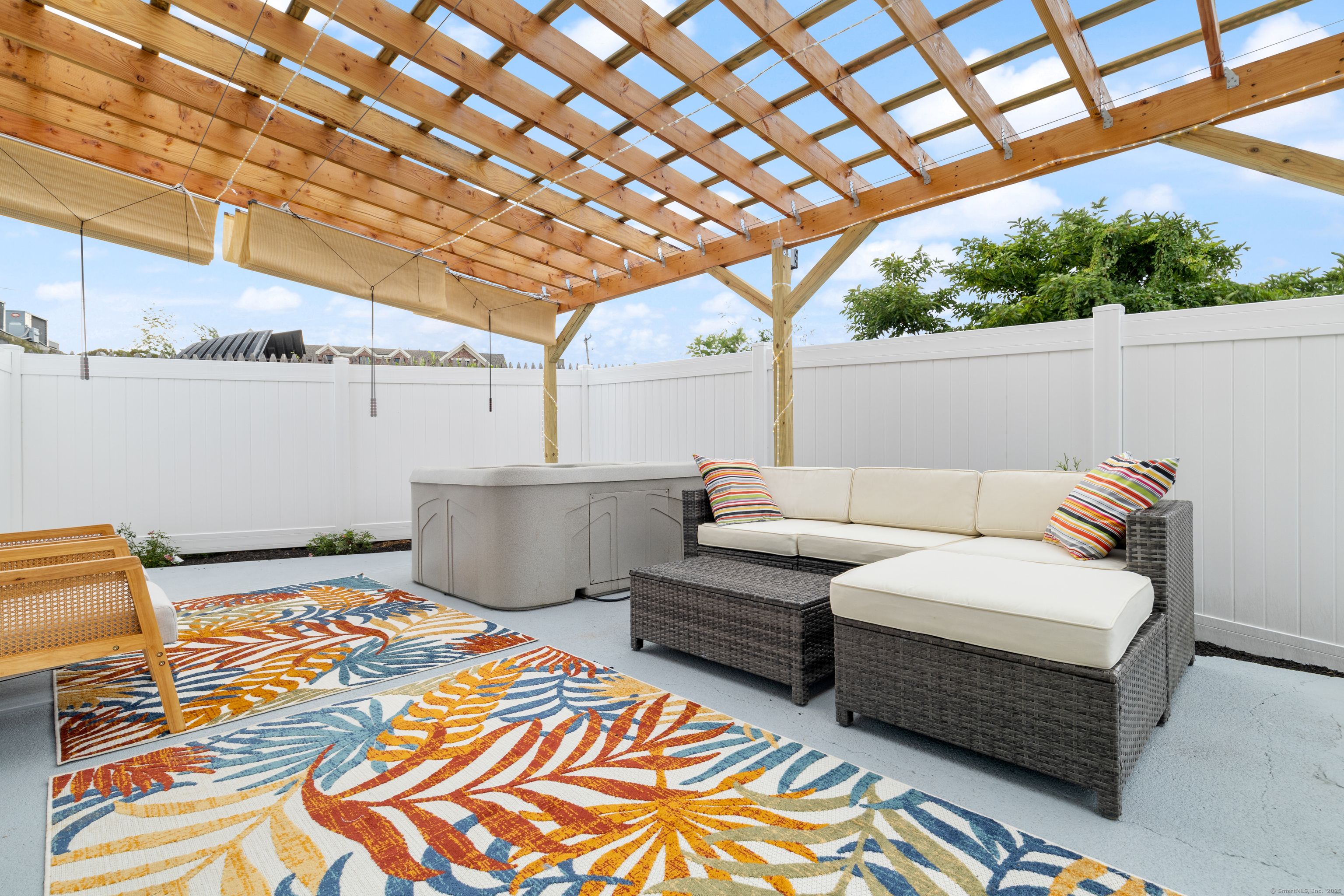 725 Boston Post Road Old Saybrook, CT 06475 - Photo 1 of 1 a balcony with furniture and a potted plant
