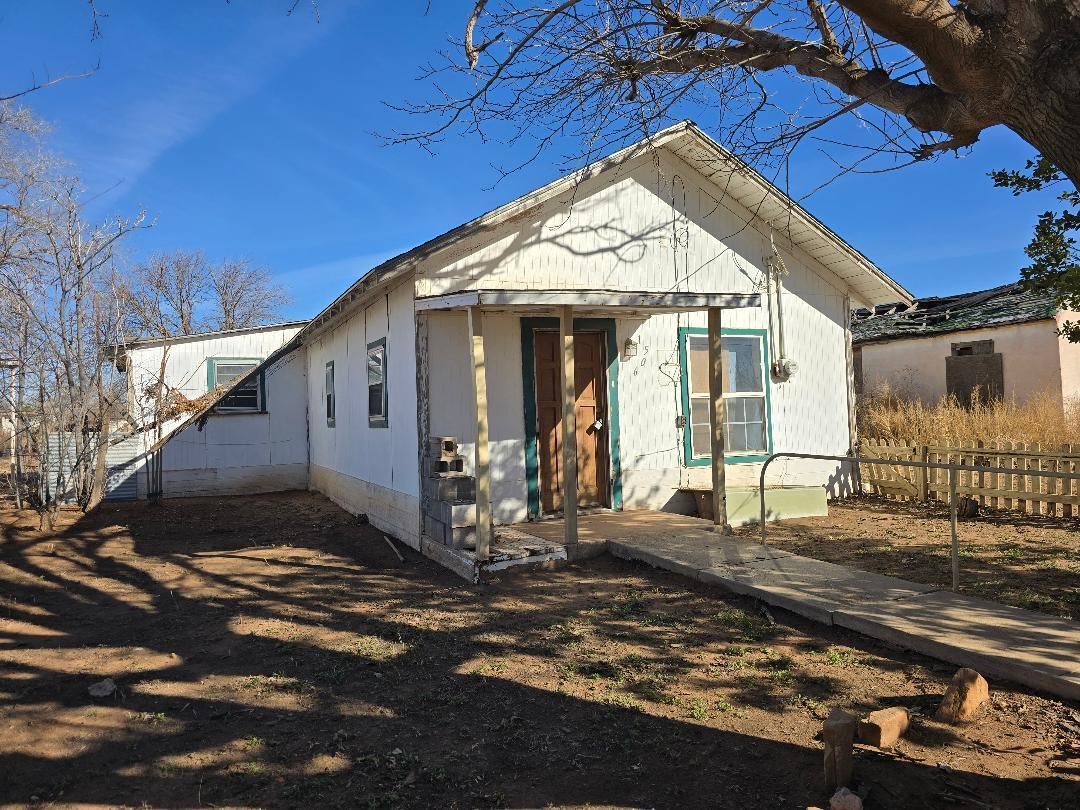 1506 North 1st Street Lamesa, TX 79331 - Photo 8 of 10 a view of a house with a backyard