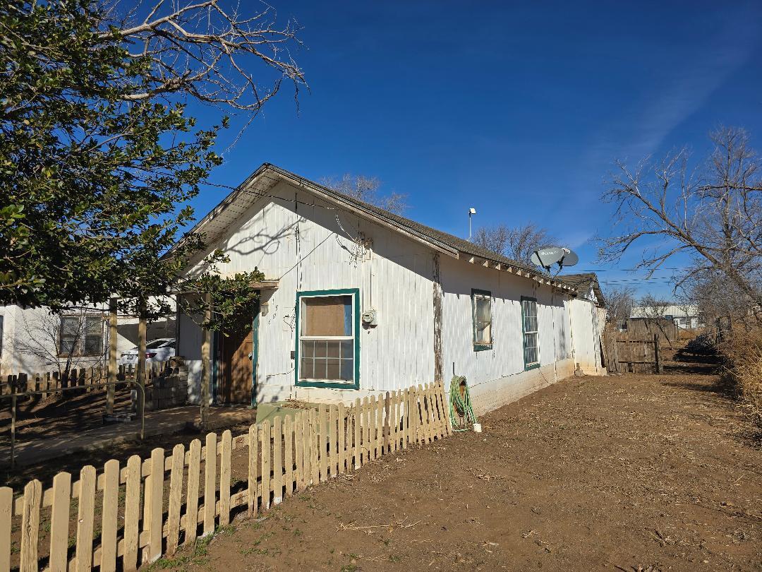1506 North 1st Street Lamesa, TX 79331 - Photo 10 of 10 a view of a house with a small yard