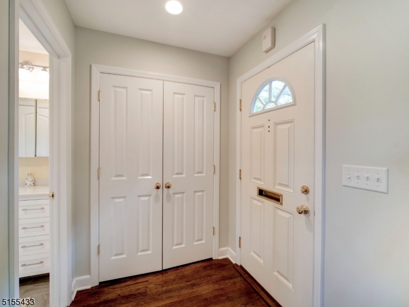33 Cliffside Trail Denville, NJ 07834 - Photo 3 of 25 a view of a livingroom with wooden floor and closet