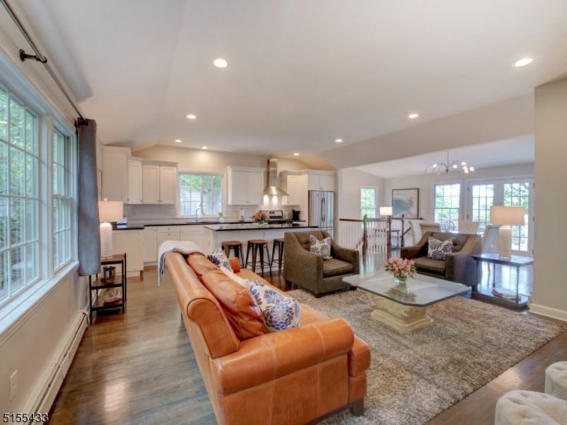 33 Cliffside Trail Denville, NJ 07834 - Photo 4 of 25 a living room with furniture wooden floor and a large window