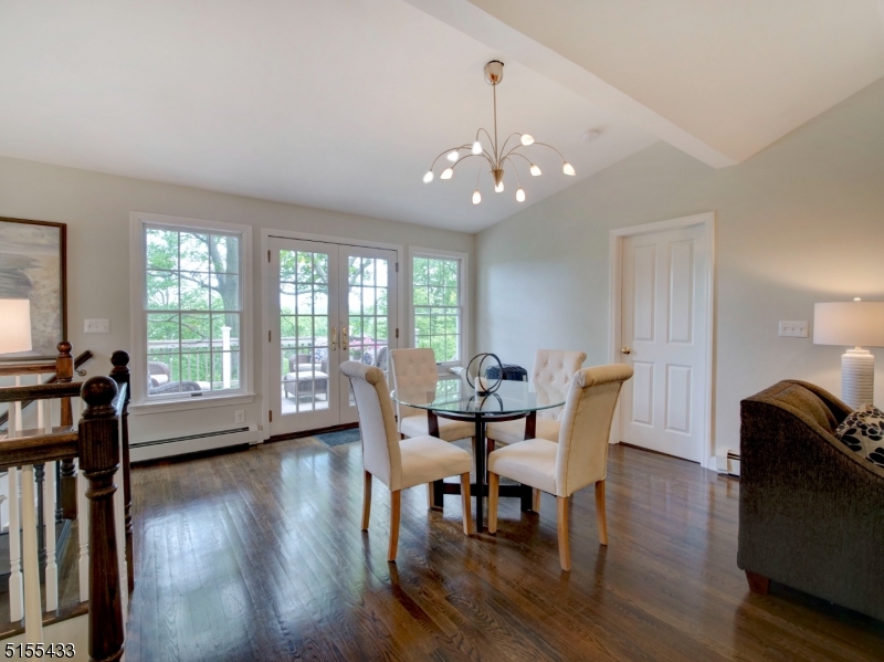 33 Cliffside Trail Denville, NJ 07834 - Photo 10 of 25 a view of a dining room with furniture window and wooden floor