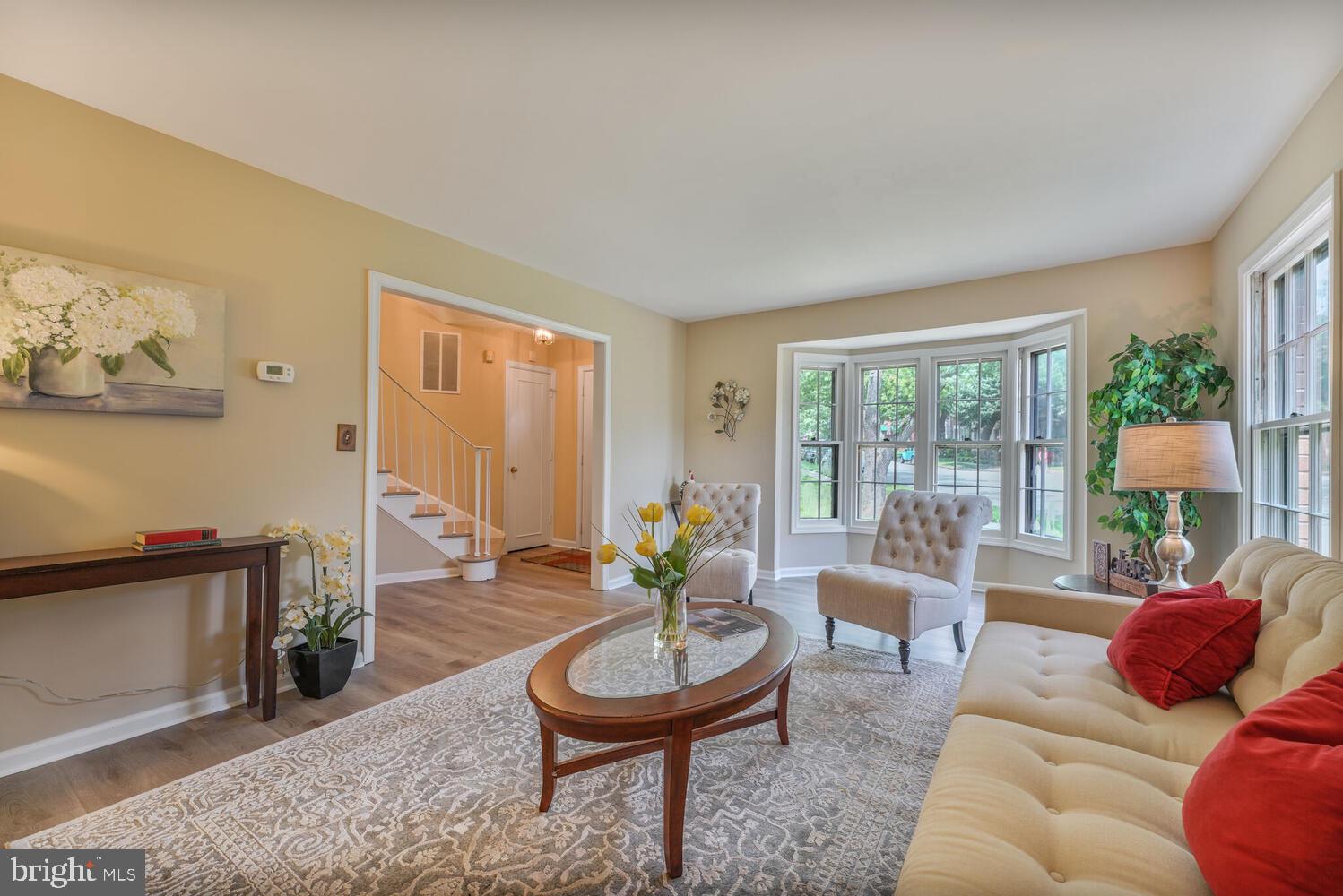 5932 Queenston Street Springfield, VA 22152 - Photo 16 of 47 a living room with furniture and a large window