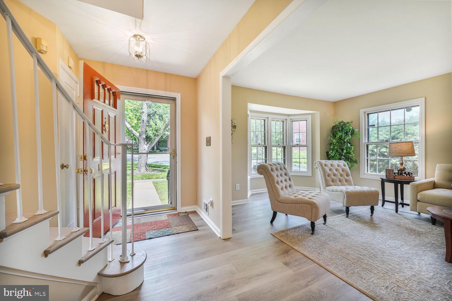 5932 Queenston Street Springfield, VA 22152 - Photo 2 of 47 a living room with furniture and a window