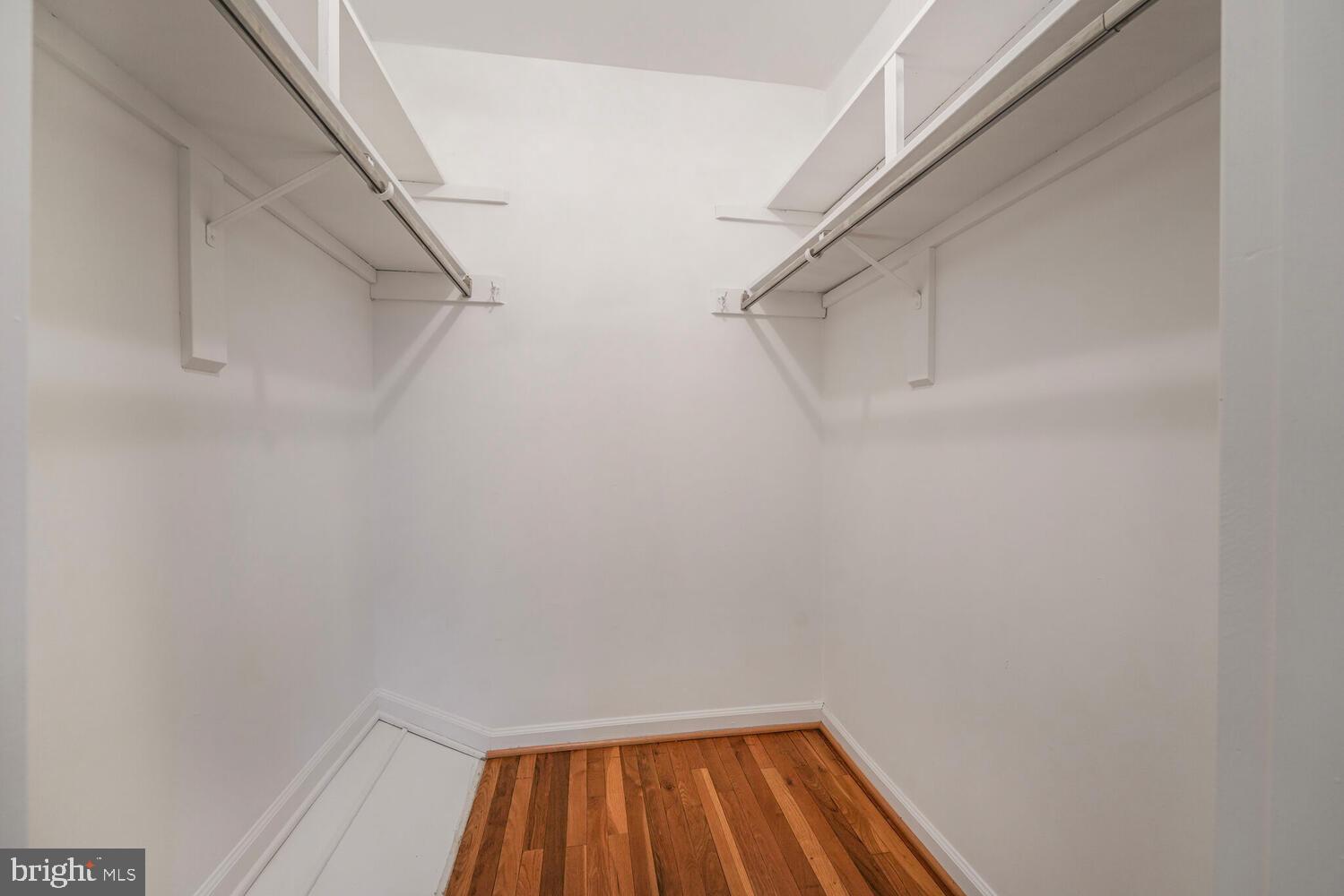 5932 Queenston Street Springfield, VA 22152 - Photo 21 of 47 a small space with racks on the wall