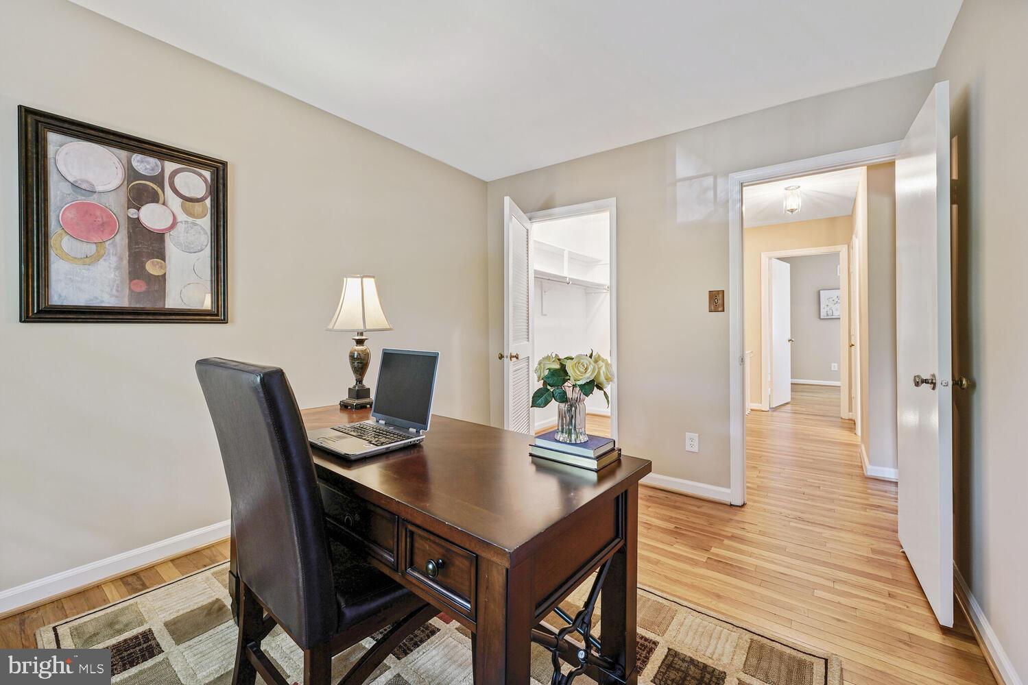 5932 Queenston Street Springfield, VA 22152 - Photo 22 of 47 a view of a dining room with furniture and wooden floor
