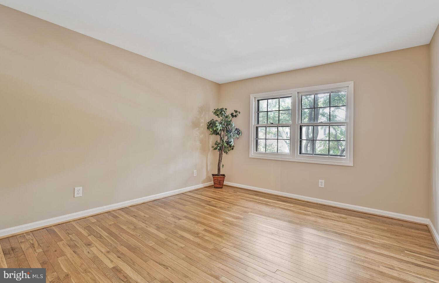 5932 Queenston Street Springfield, VA 22152 - Photo 24 of 47 wooden floor in an empty room with a window