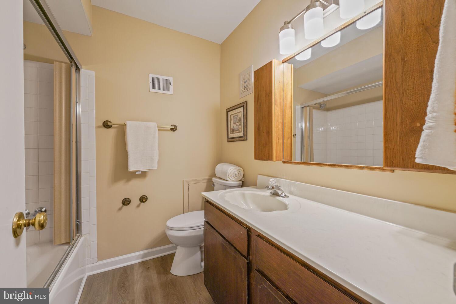 5932 Queenston Street Springfield, VA 22152 - Photo 25 of 47 a bathroom with a sink a toilet and shower