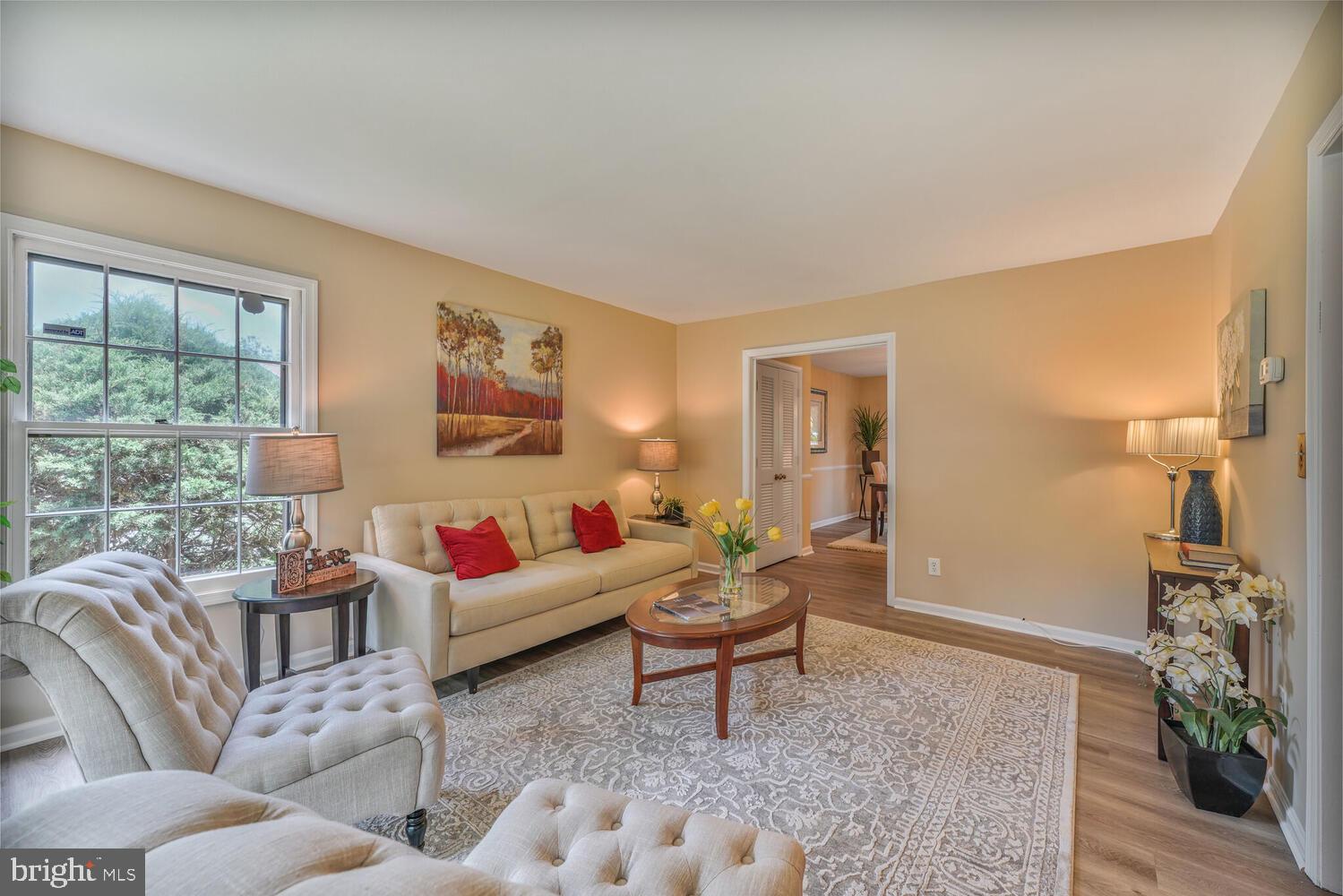 5932 Queenston Street Springfield, VA 22152 - Photo 5 of 47 a living room with furniture and a window