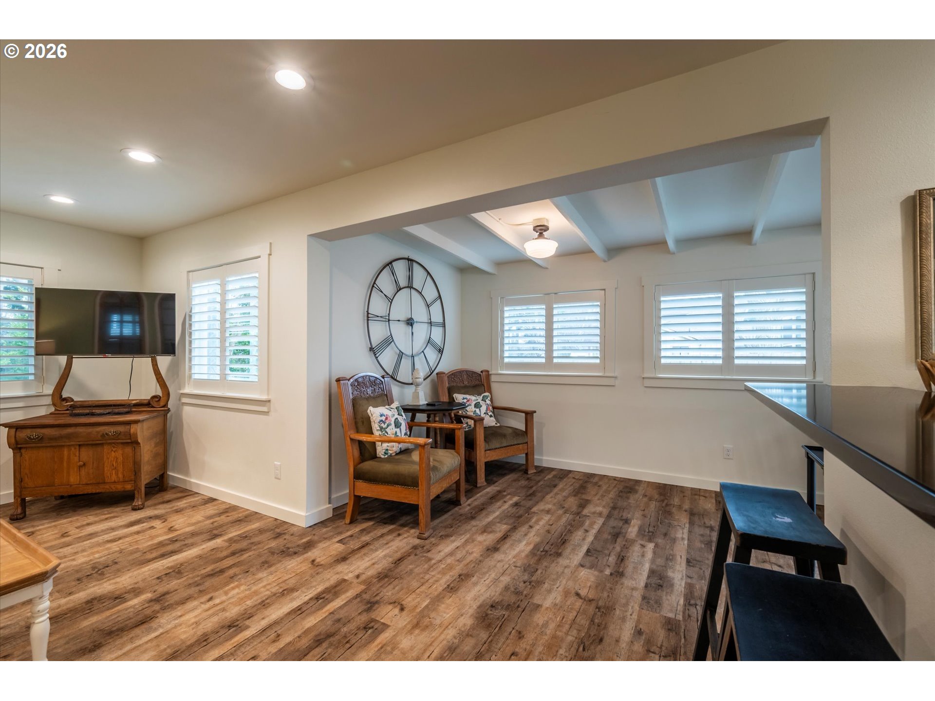 770 9th Street Southeast Bandon, OR 97411 - Photo 22 of 47 a living room with furniture and a flat screen tv