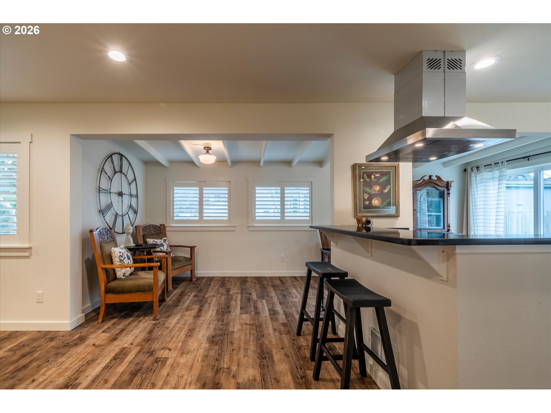 770 9th Street Southeast Bandon, OR 97411 - Photo 23 of 47 a living room with furniture and a wooden floor