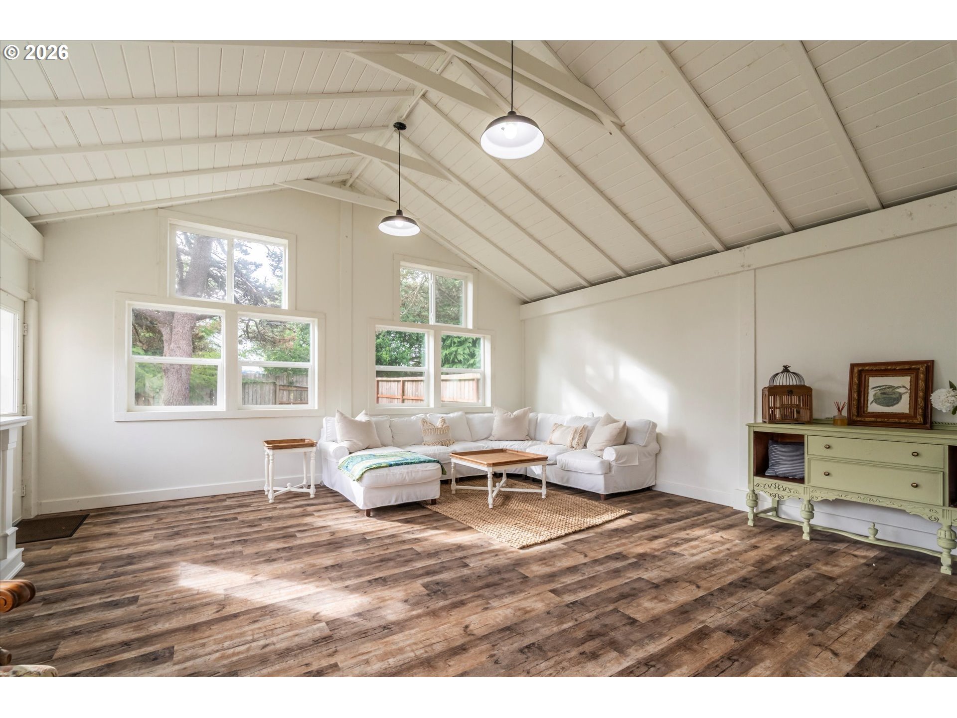 770 9th Street Southeast Bandon, OR 97411 - Photo 28 of 47 a living room with furniture window and wooden floor