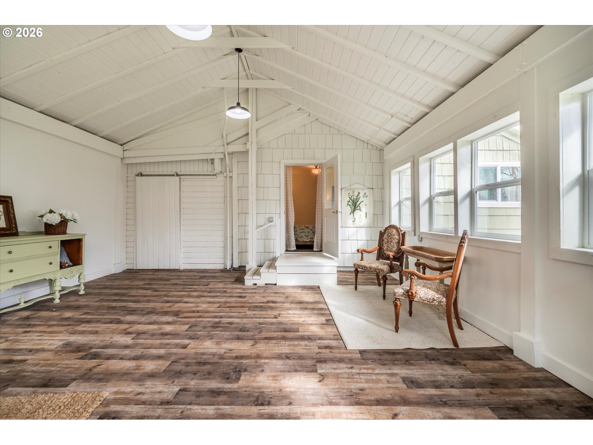 770 9th Street Southeast Bandon, OR 97411 - Photo 29 of 47 a view of a livingroom with furniture window and wooden floor