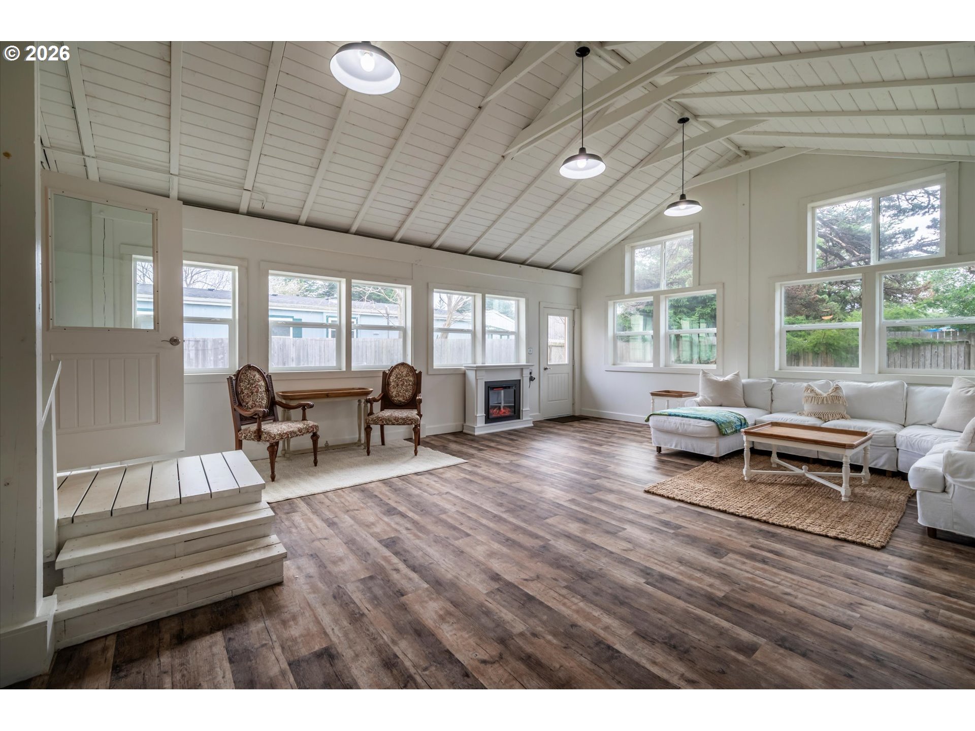 770 9th Street Southeast Bandon, OR 97411 - Photo 32 of 47 a living room with furniture and a wooden floor