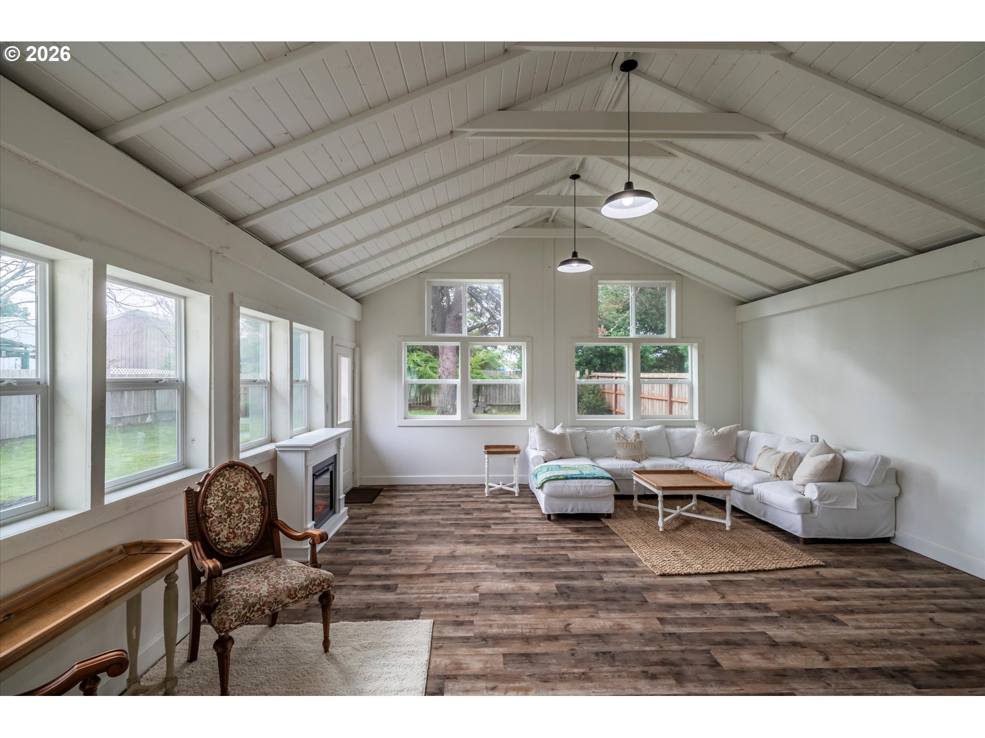 770 9th Street Southeast Bandon, OR 97411 - Photo 33 of 47 a living room with furniture and large windows