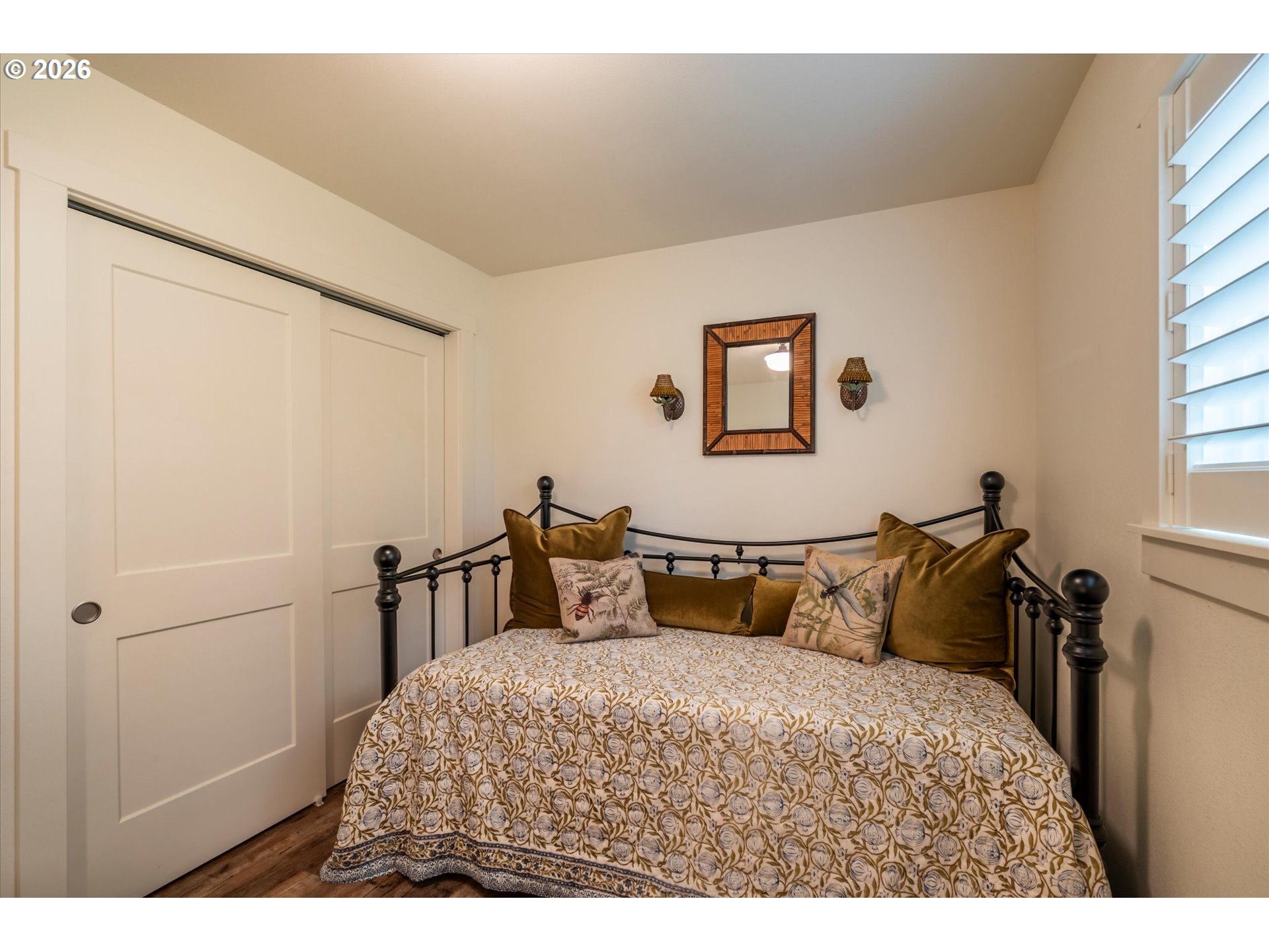 770 9th Street Southeast Bandon, OR 97411 - Photo 39 of 47 a bedroom with a bed and a window