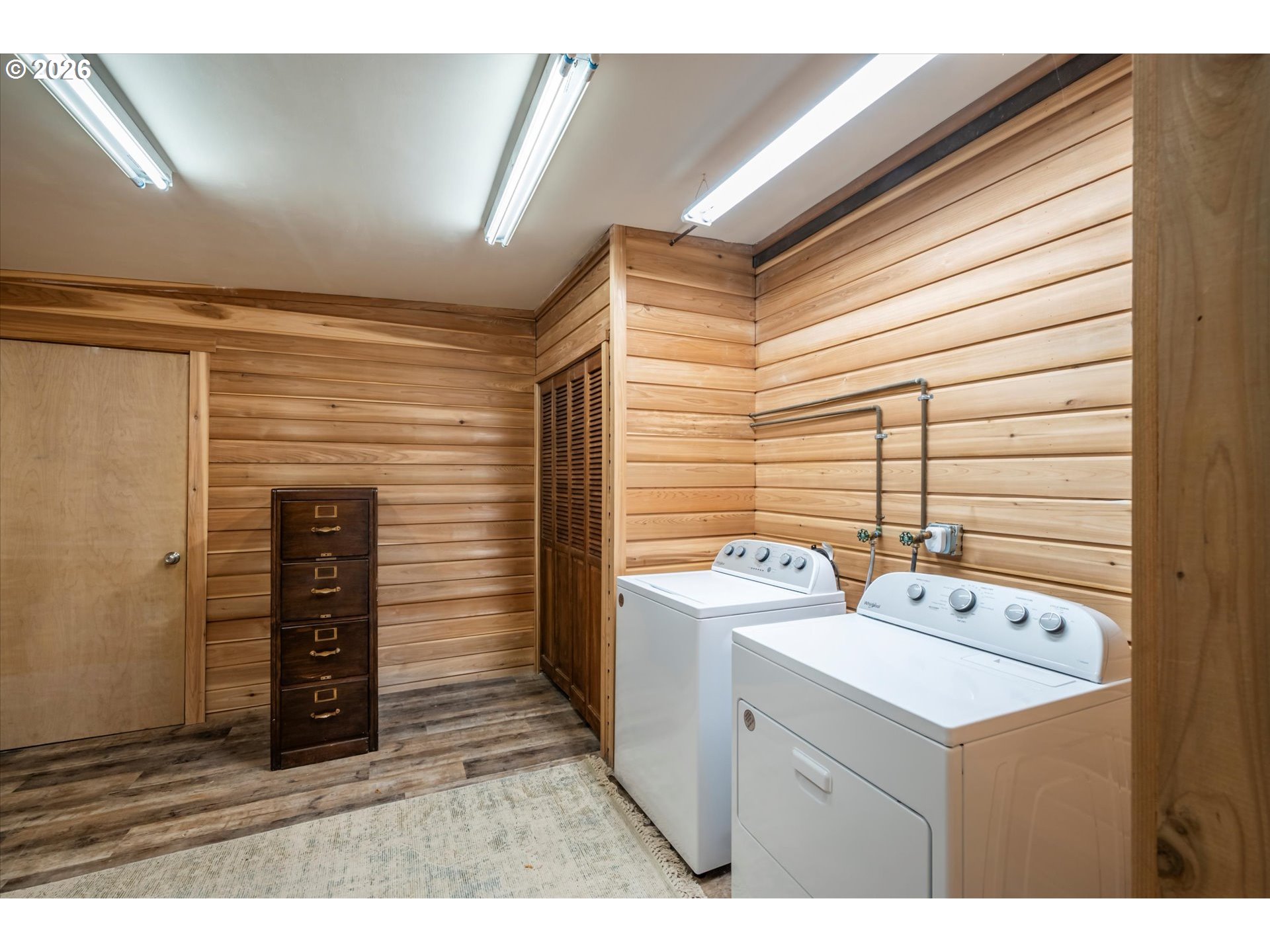770 9th Street Southeast Bandon, OR 97411 - Photo 40 of 47 a kitchen with a stove and a refrigerator