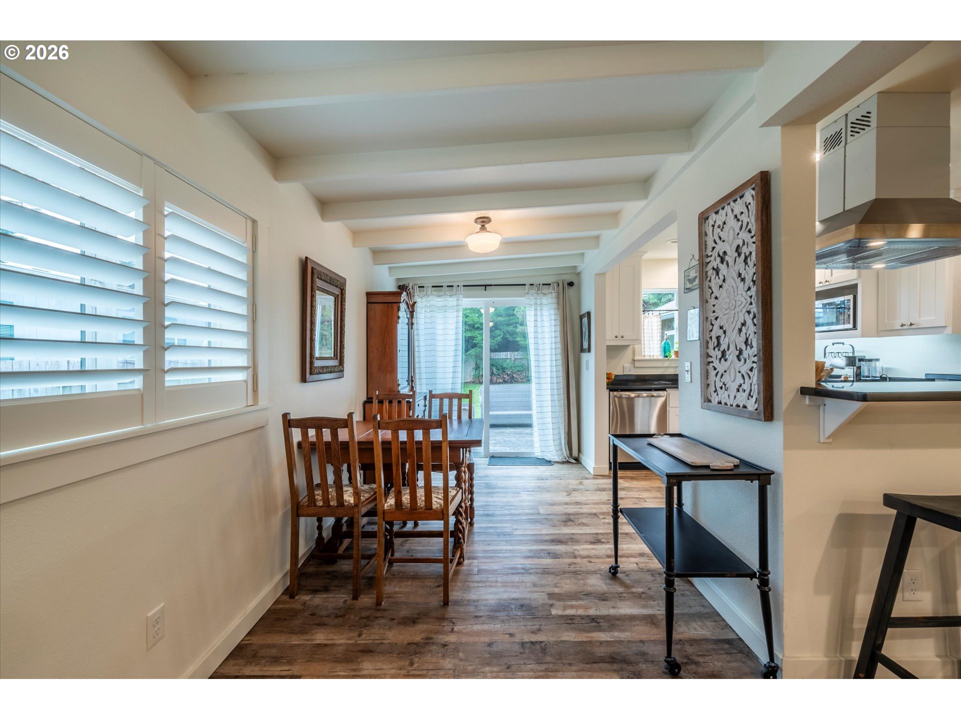 770 9th Street Southeast Bandon, OR 97411 - Photo 41 of 47 a balcony with chairs and table