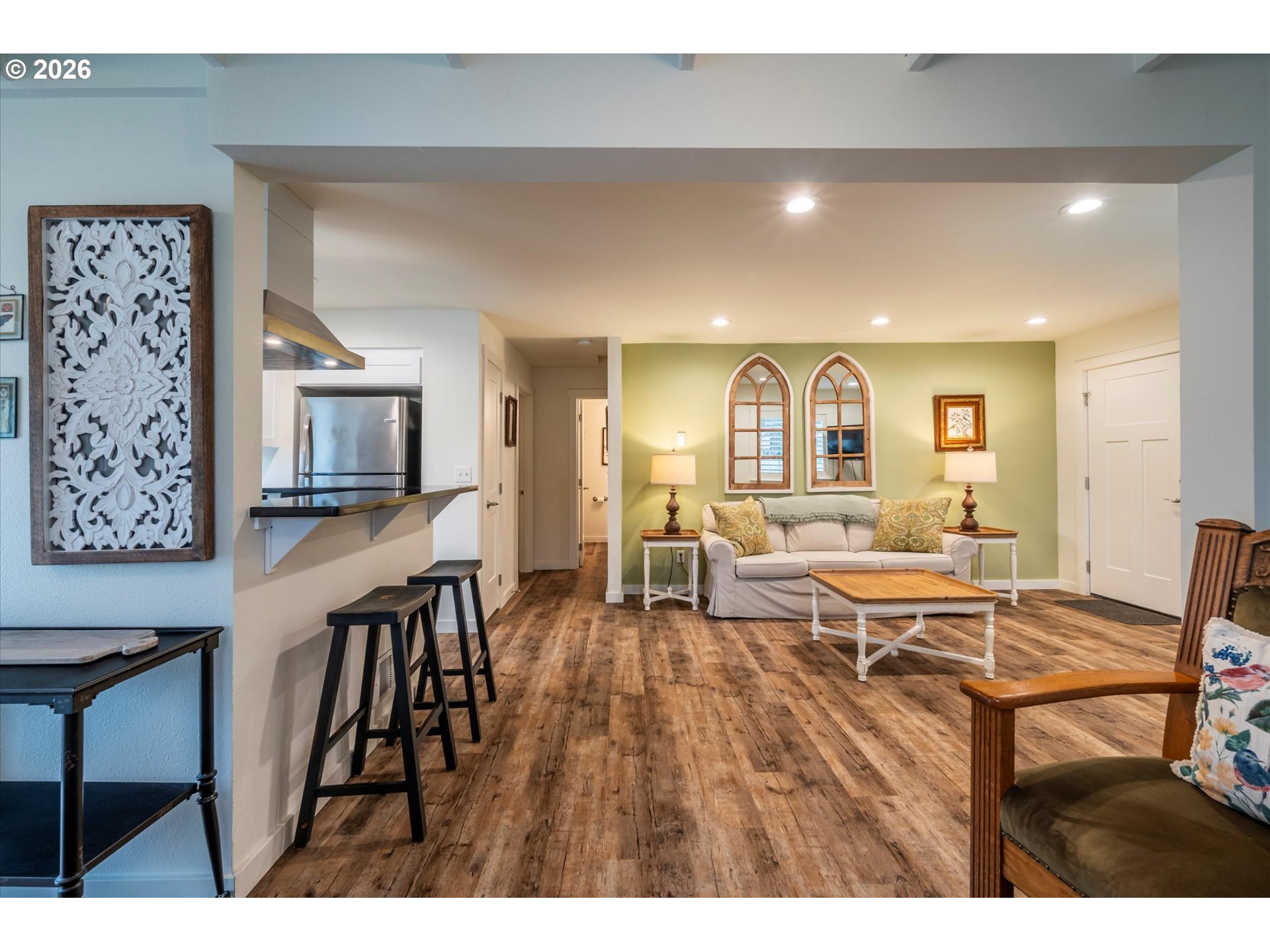 770 9th Street Southeast Bandon, OR 97411 - Photo 44 of 47 a living room with furniture and a flat screen tv