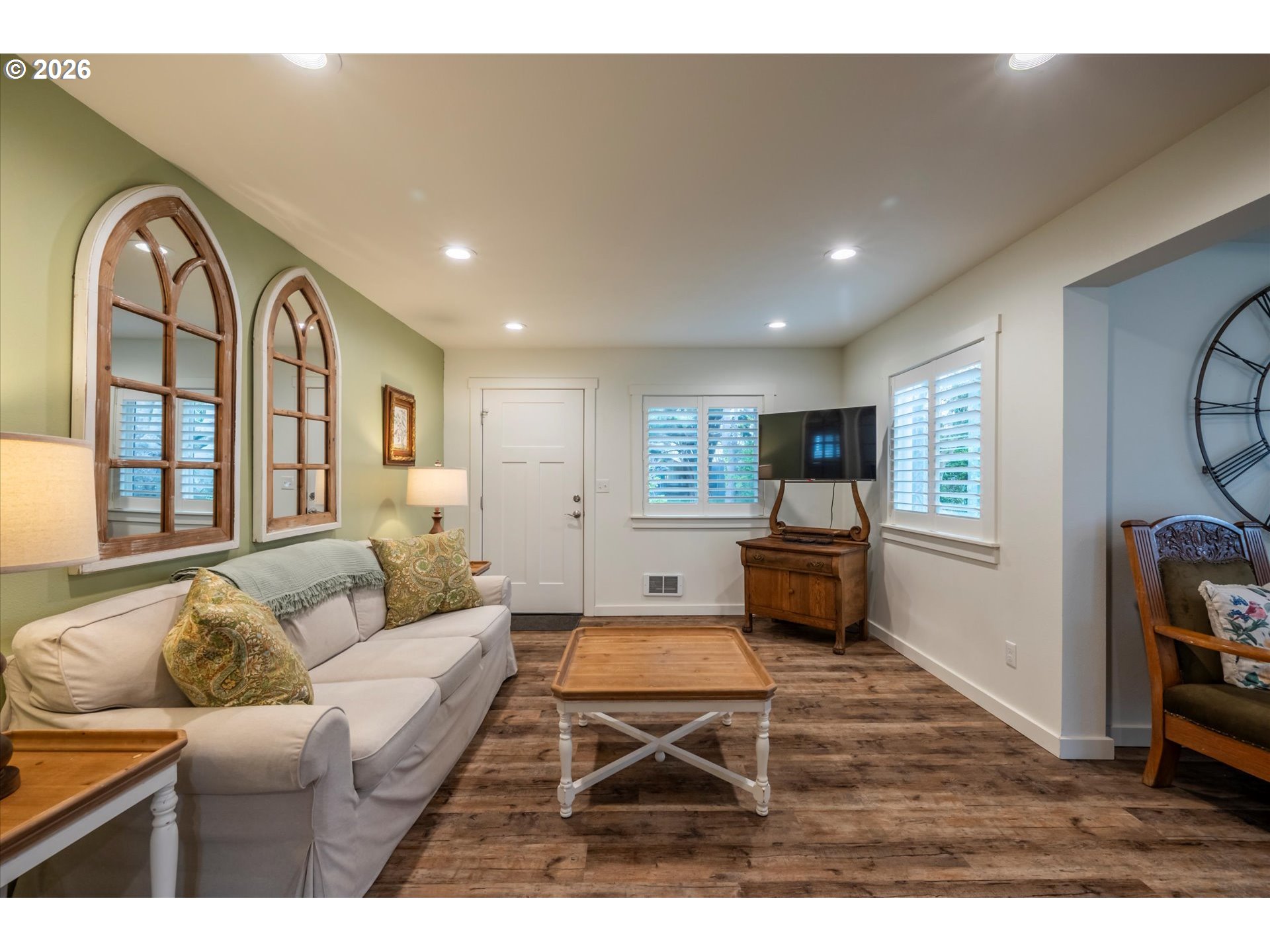 770 9th Street Southeast Bandon, OR 97411 - Photo 9 of 47 a living room with furniture and wooden floor