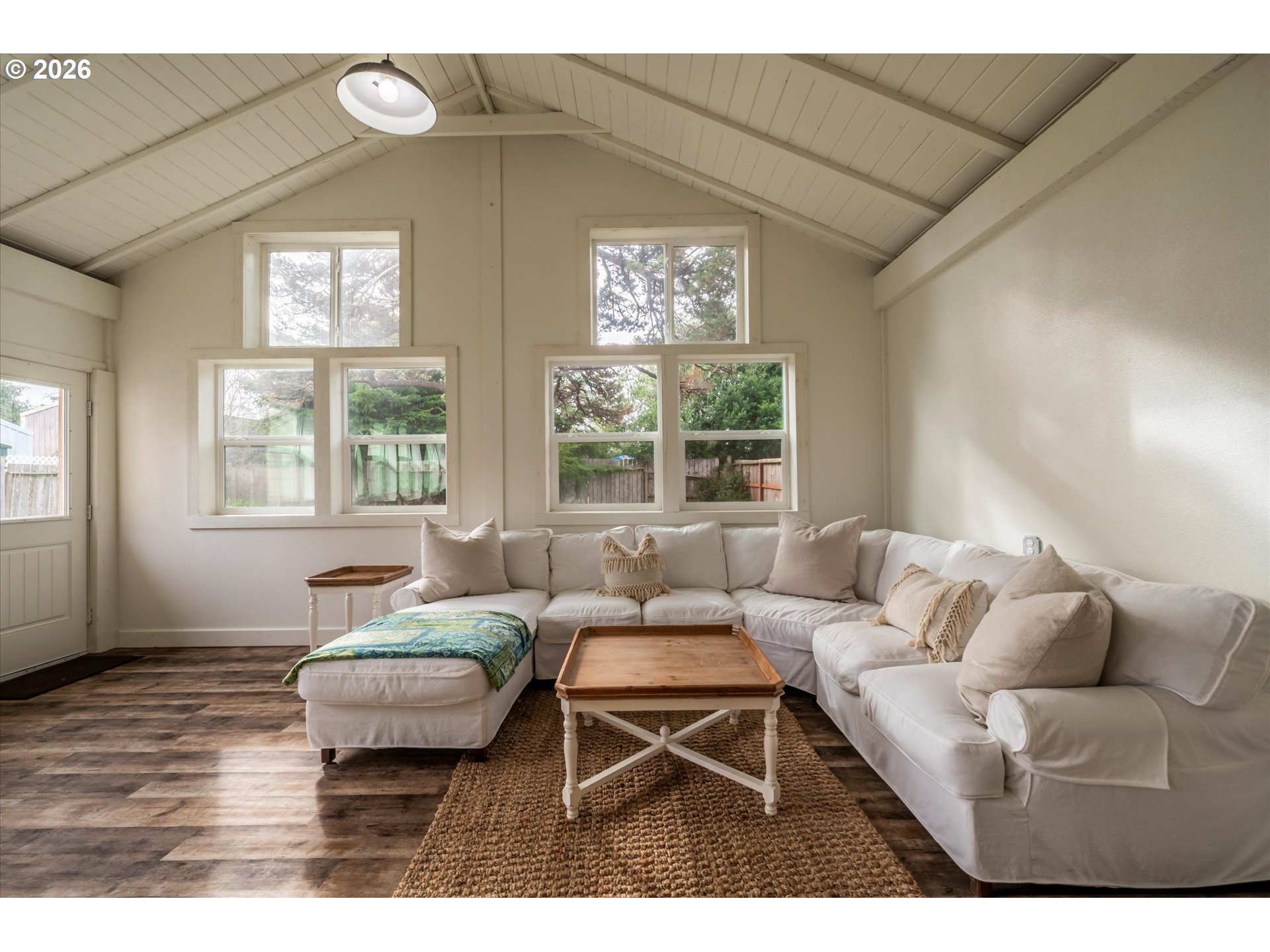 770 9th Street Southeast Bandon, OR 97411 - Photo 10 of 47 a living room with furniture and windows