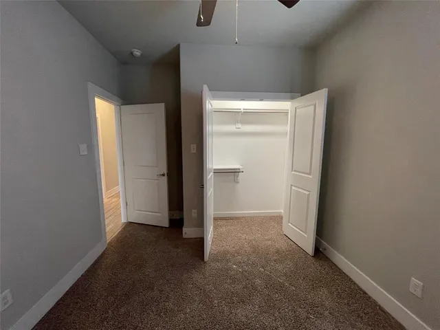 an empty room with closet