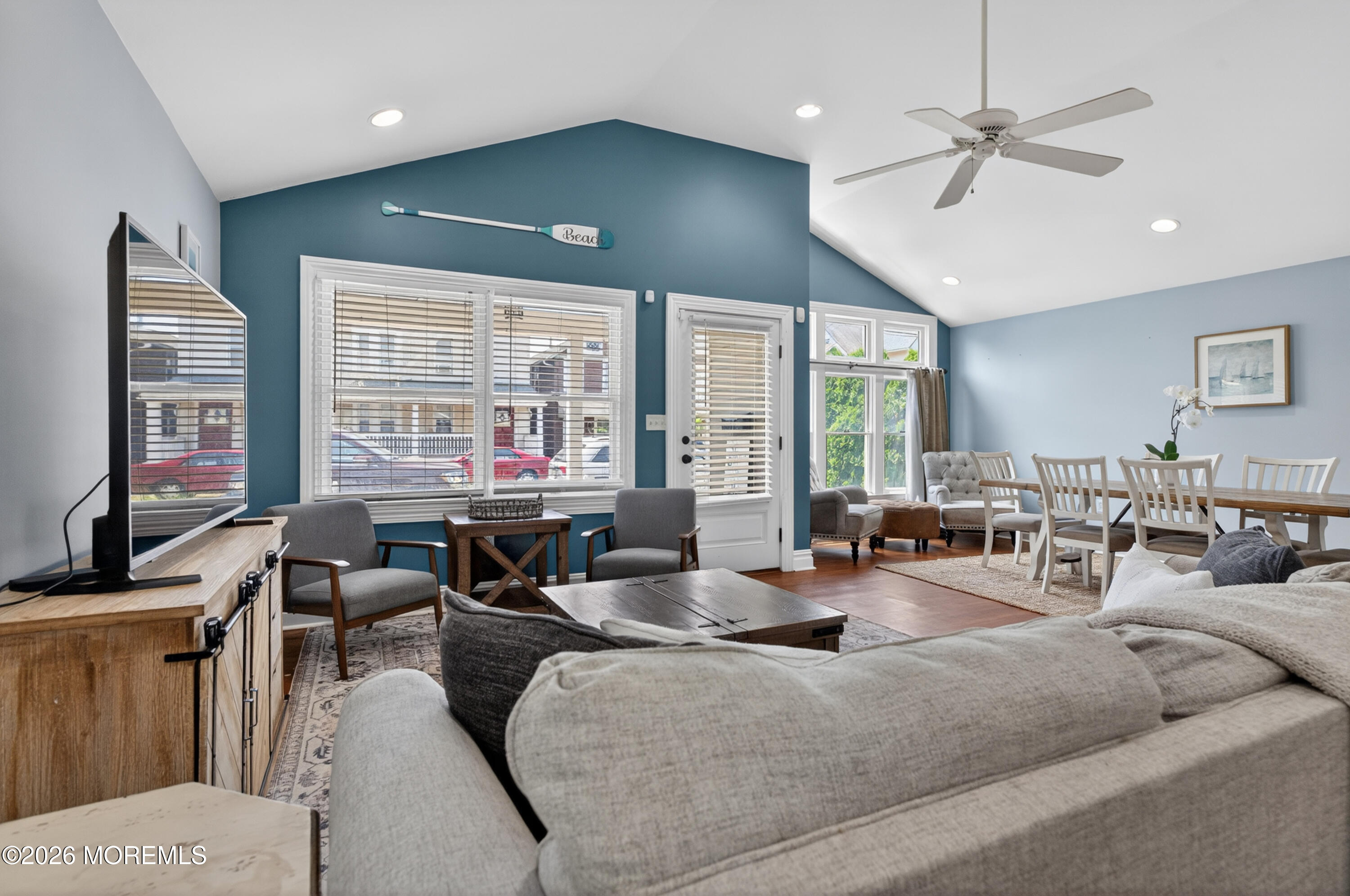 65 Heck Avenue Ocean Grove, NJ 07756 - Photo 12 of 37 a living room with lots of furniture and a flat screen tv
