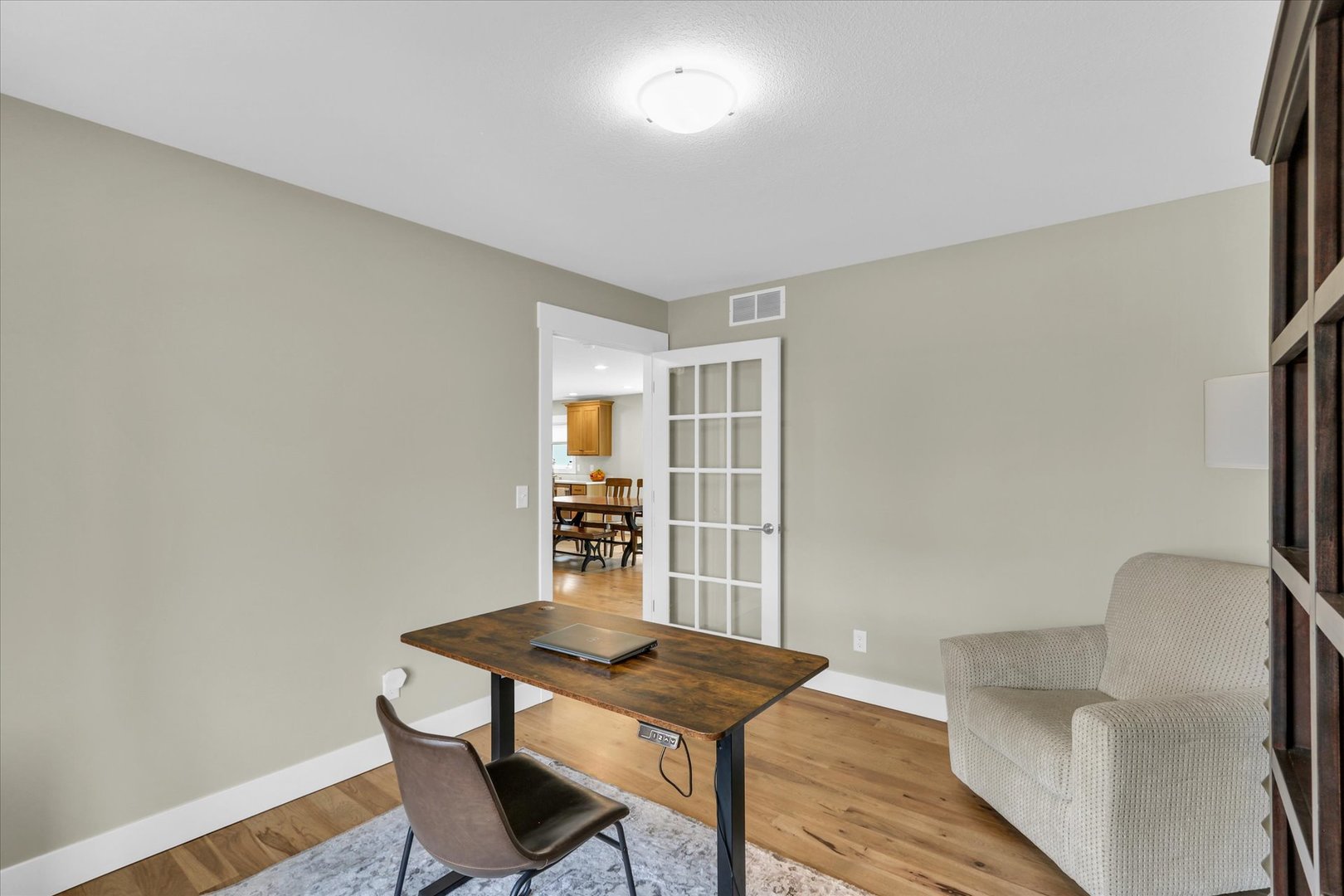1403 Winterberry Road Savoy, IL 61874 - Photo 15 of 47 a view of a livingroom with furniture and wooden floor