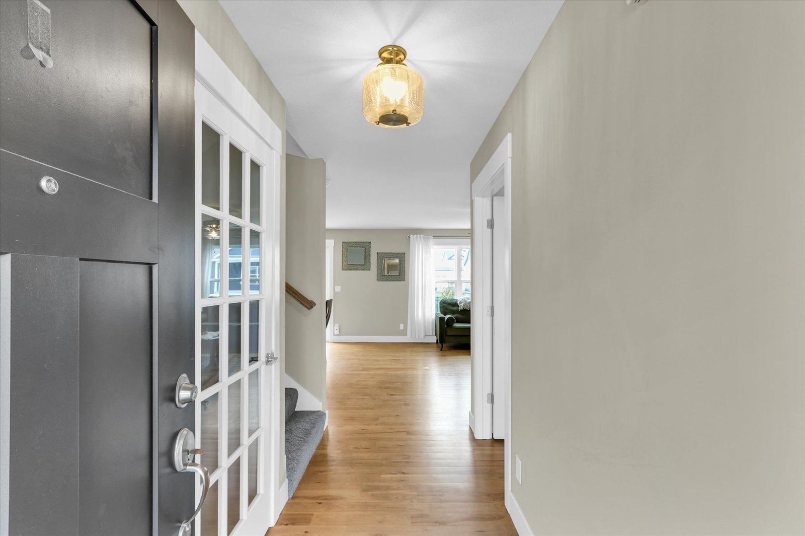 1403 Winterberry Road Savoy, IL 61874 - Photo 2 of 47 a view of a hallway with a chandelier