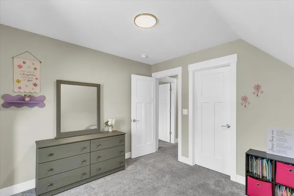 a room with furniture and a mirror