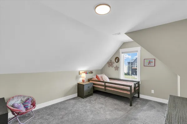 a room with stairs and a furniture