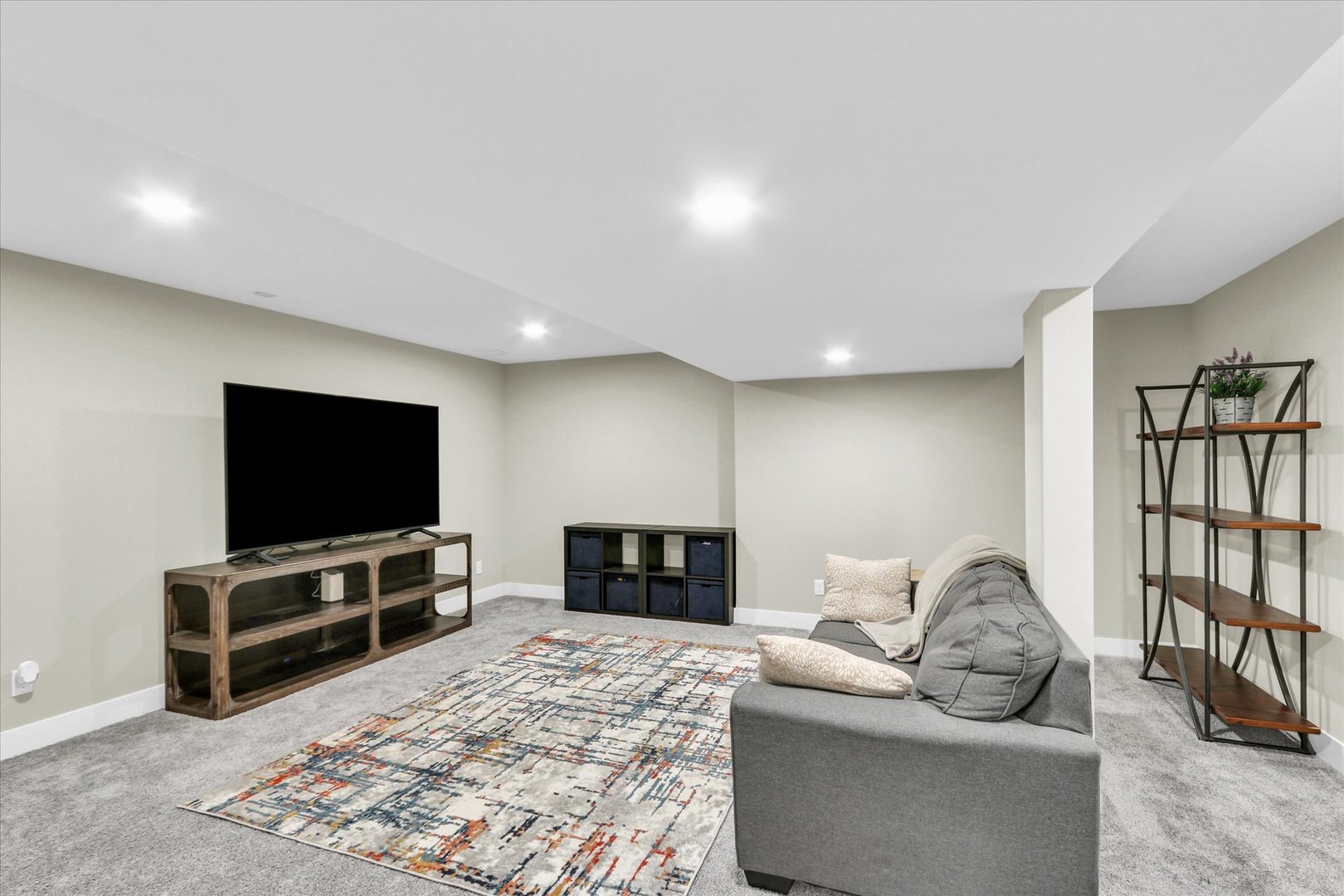 1403 Winterberry Road Savoy, IL 61874 - Photo 30 of 47 a living room with furniture and a flat screen tv