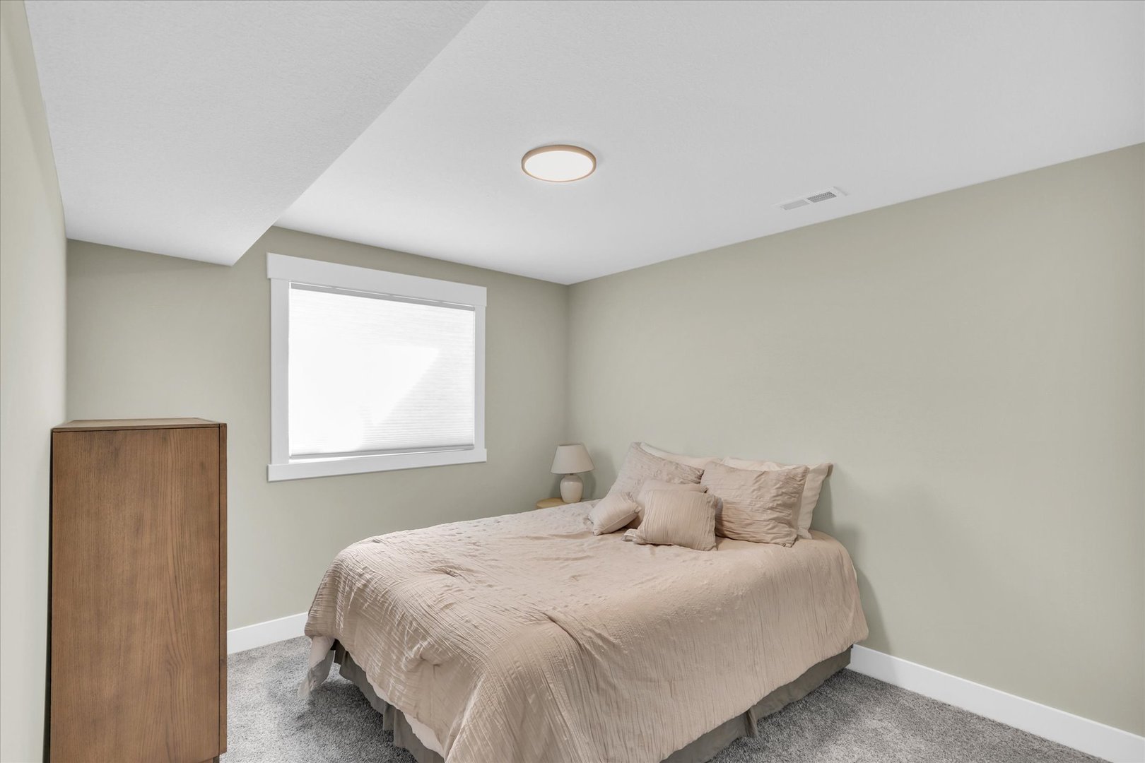 1403 Winterberry Road Savoy, IL 61874 - Photo 32 of 47 a large bed sitting in a bedroom next to a window